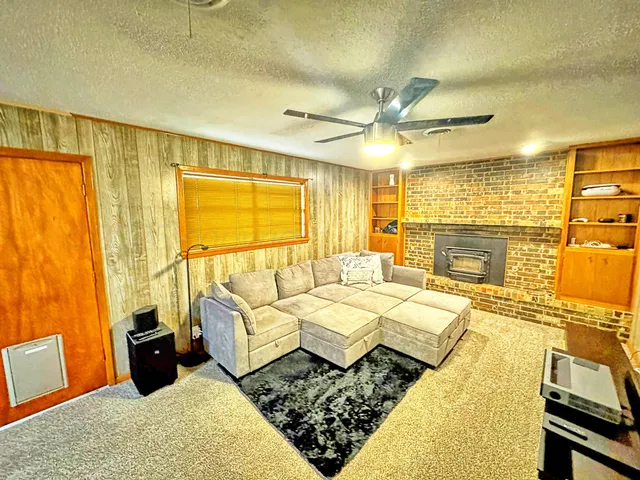 a bed room with a bed and a couch