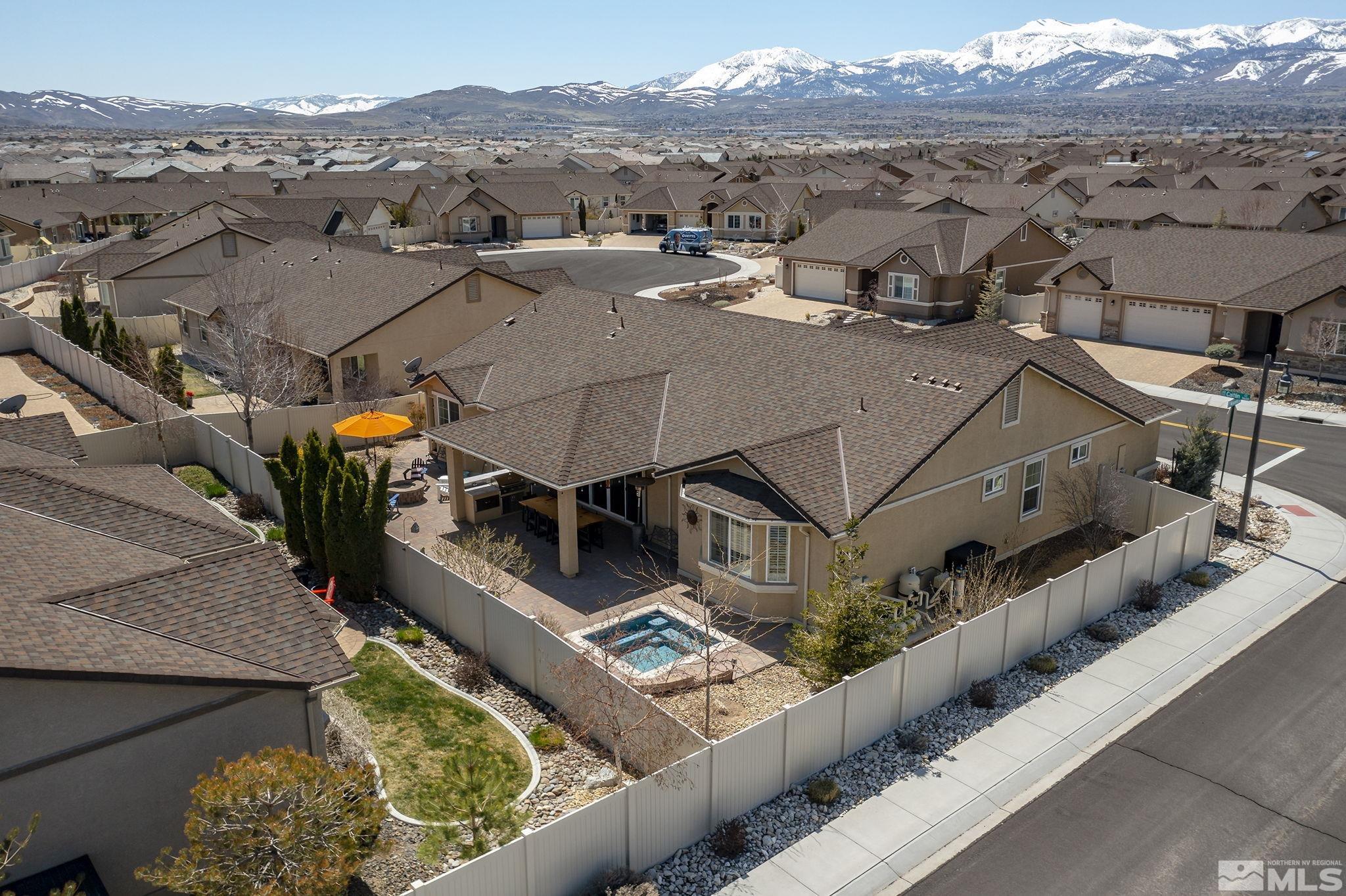 9600 Caitlin Court Reno, NV 89521 - Photo 28 of 35 an aerial view of a house with a mountain