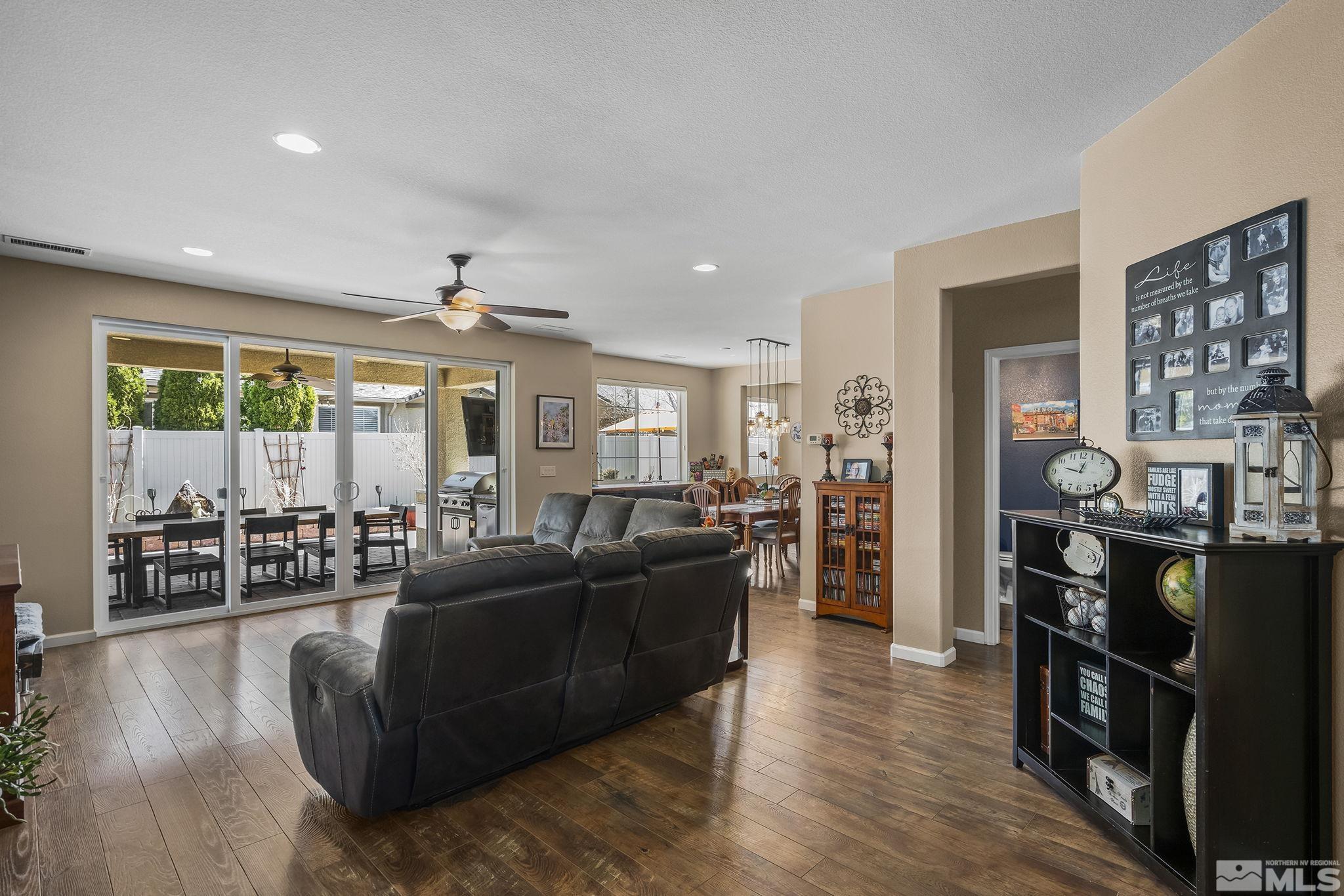 9600 Caitlin Court Reno, NV 89521 - Photo 3 of 35 a living room with furniture and wooden floor