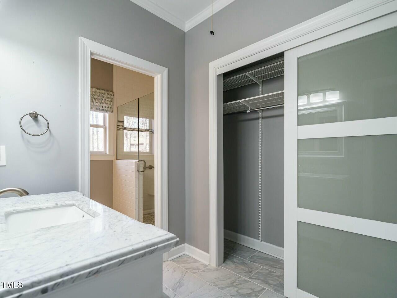 5917 Sentinel Drive Raleigh, NC 27609 - Photo 21 of 32 a room with a sink and closet