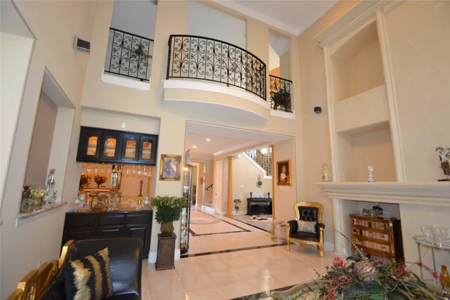 a view of a living room and entryway