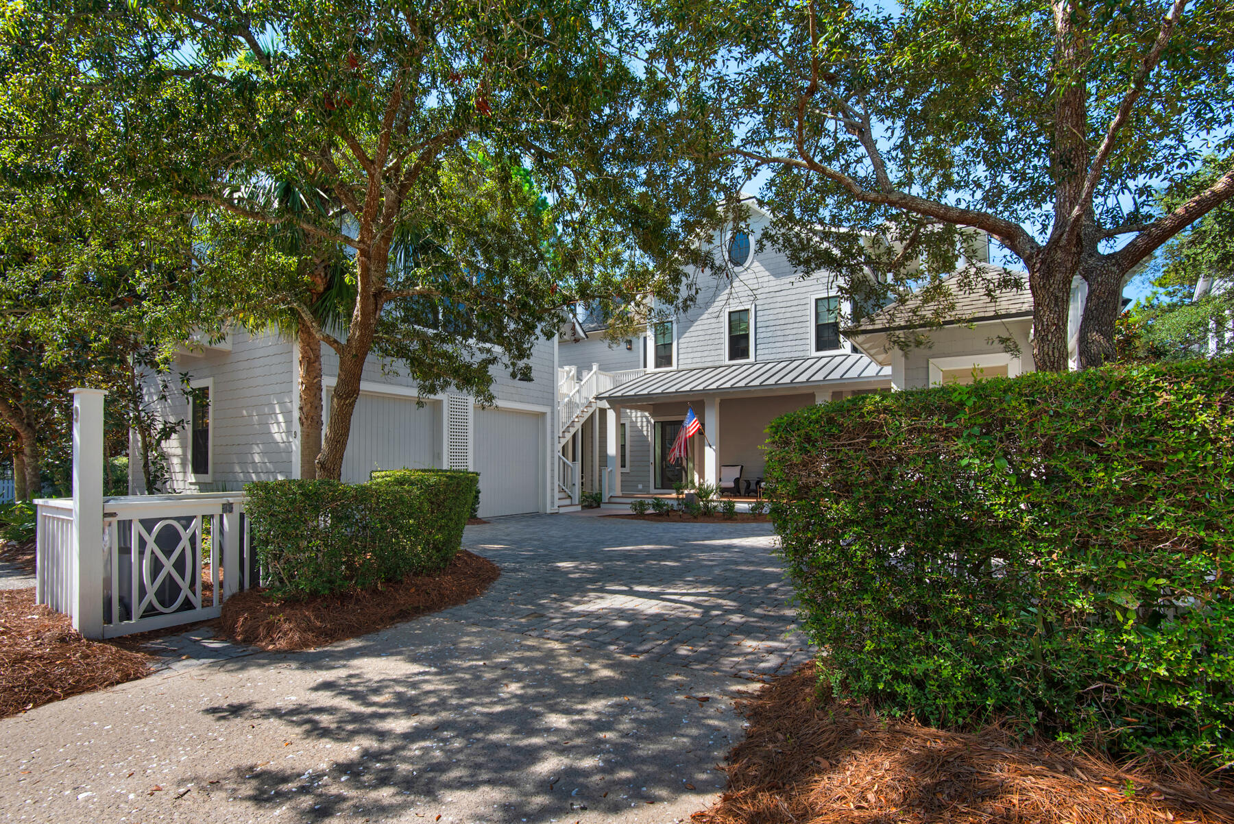9 Tidepool Lane Inlet Beach, FL 32461 - Photo 2 of 86 a front view of a house with a garden