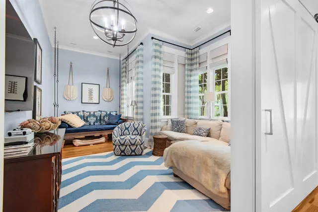 a bathroom with a sink a mirror and a shower