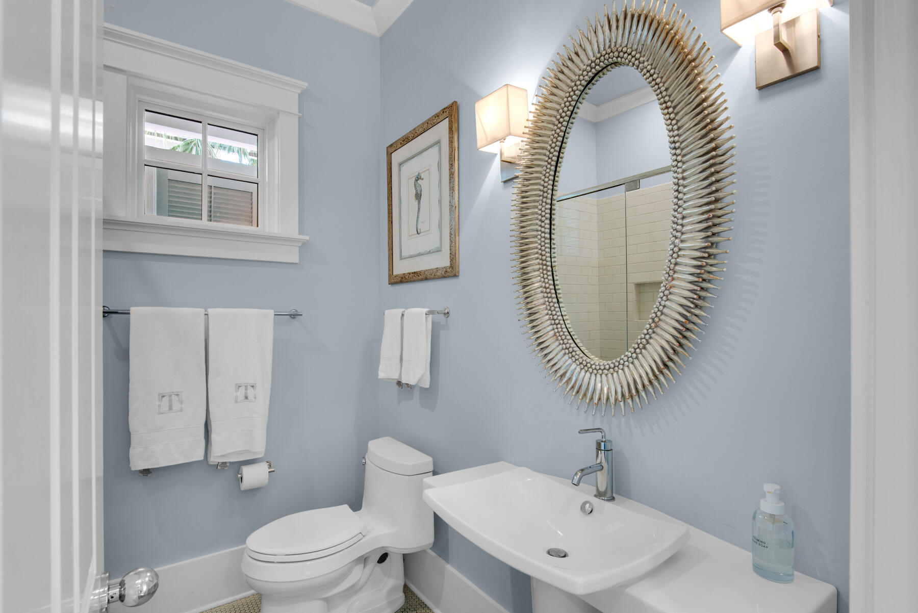 9 Tidepool Lane Inlet Beach, FL 32461 - Photo 34 of 86 a bathroom with a sink a toilet and a mirror