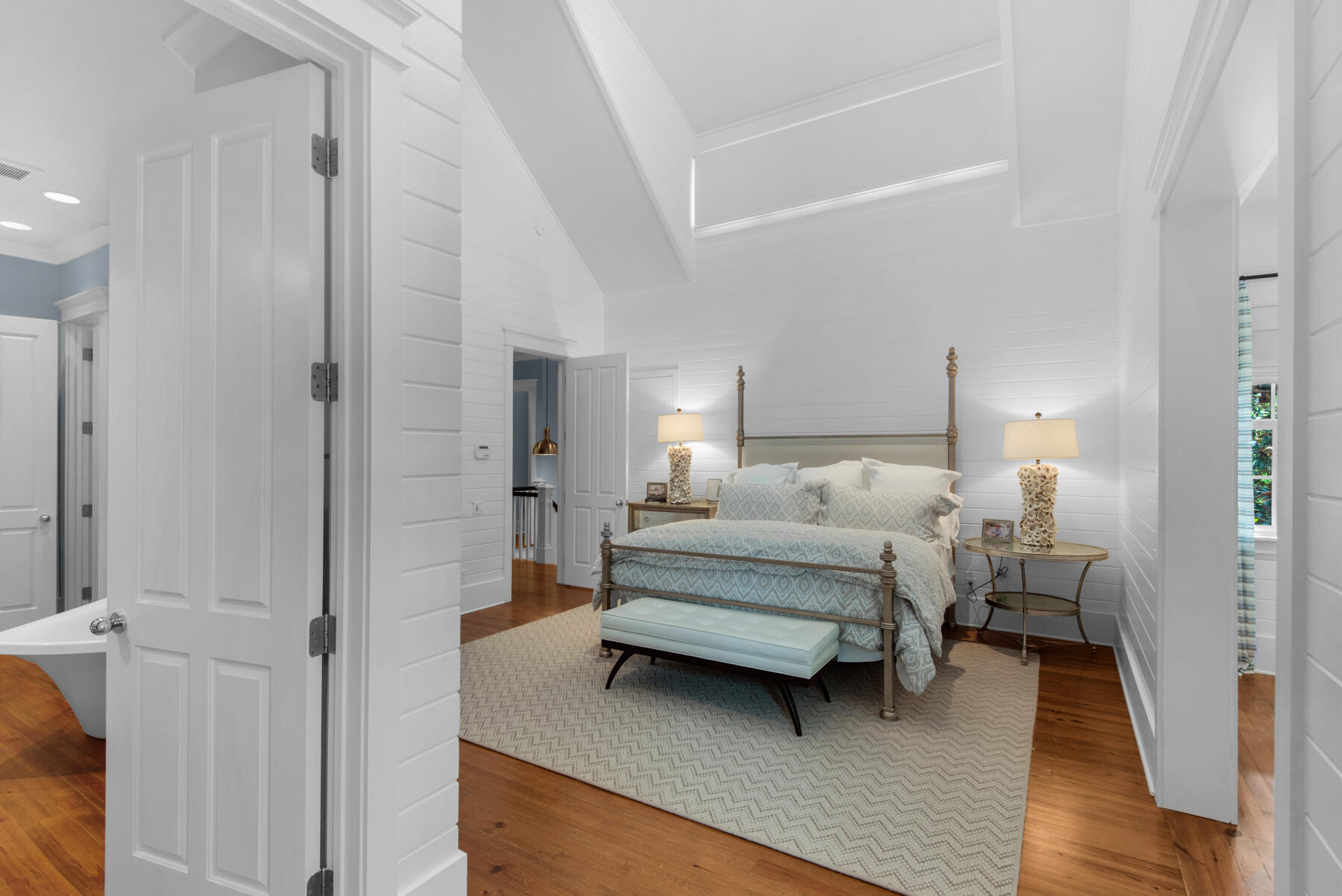 9 Tidepool Lane Inlet Beach, FL 32461 - Photo 39 of 86 a spacious bedroom with a bed and a lamp