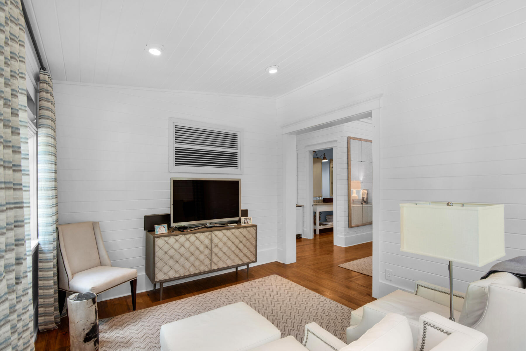 9 Tidepool Lane Inlet Beach, FL 32461 - Photo 44 of 86 a living room with furniture and a flat screen tv