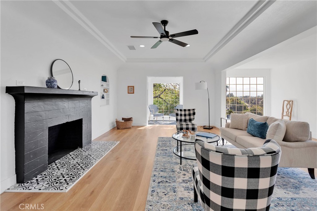 3489 Circle Road San Bernardino, CA 92405 - Photo 11 of 51 a living room with furniture and a fireplace