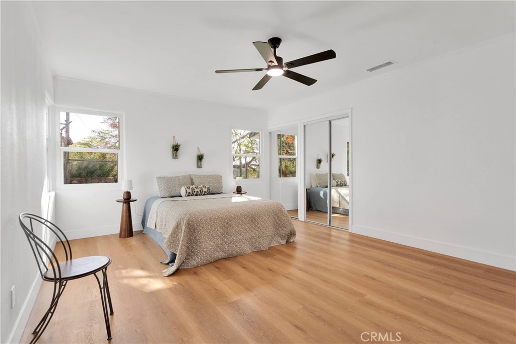 3489 Circle Road San Bernardino, CA 92405 - Photo 25 of 51 a bedroom with a bed and a chair