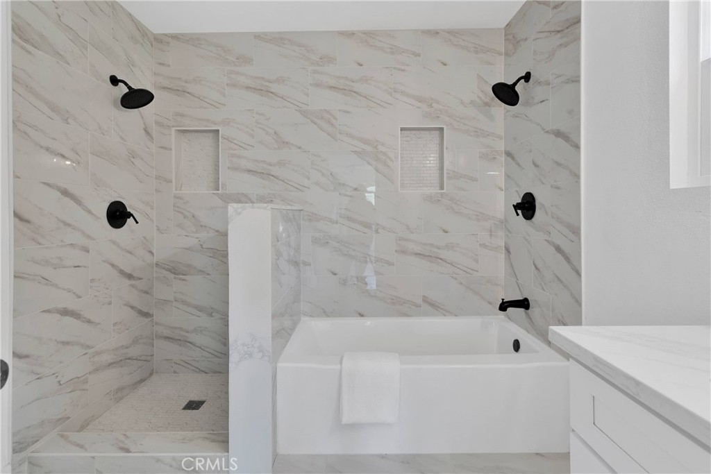 3489 Circle Road San Bernardino, CA 92405 - Photo 27 of 51 a bathroom with a bathtub