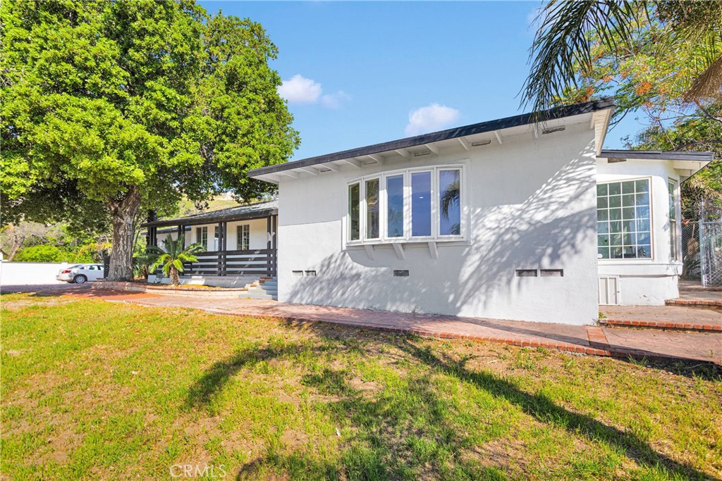 3489 Circle Road San Bernardino, CA 92405 - Photo 3 of 51 a swimming pool with outdoor seating and yard