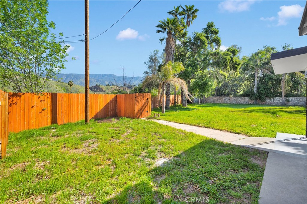 3489 Circle Road San Bernardino, CA 92405 - Photo 32 of 51 a view of yard with swimming pool