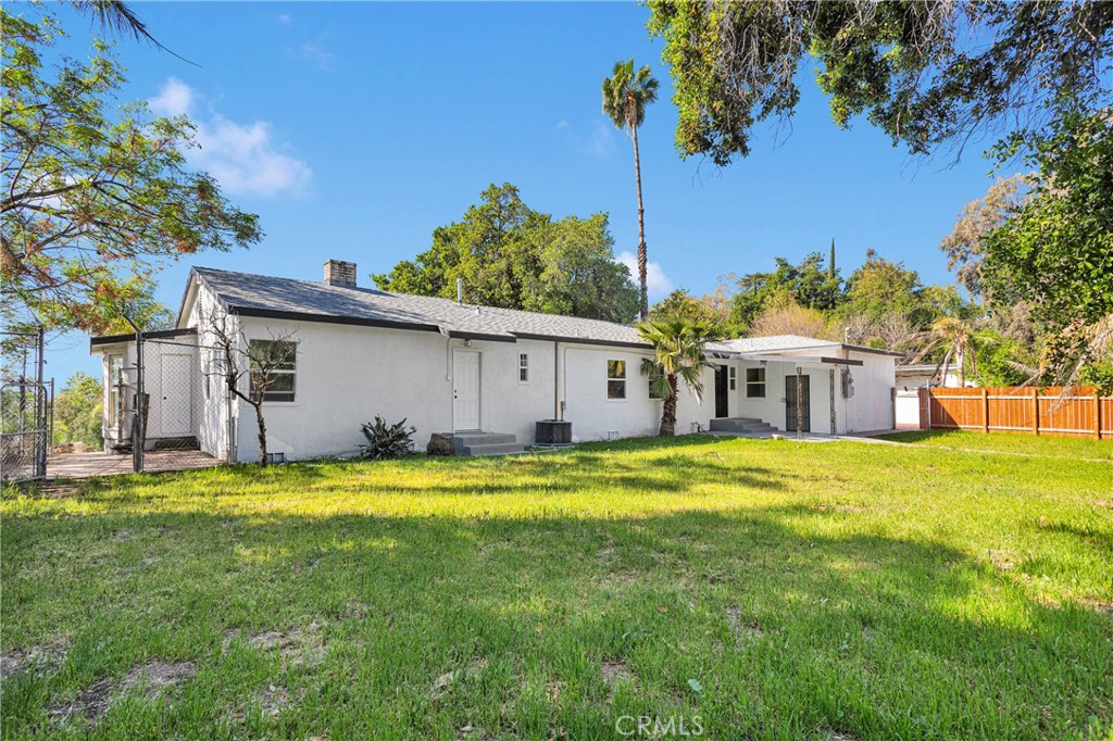 3489 Circle Road San Bernardino, CA 92405 - Photo 36 of 51 a view of a house with a yard