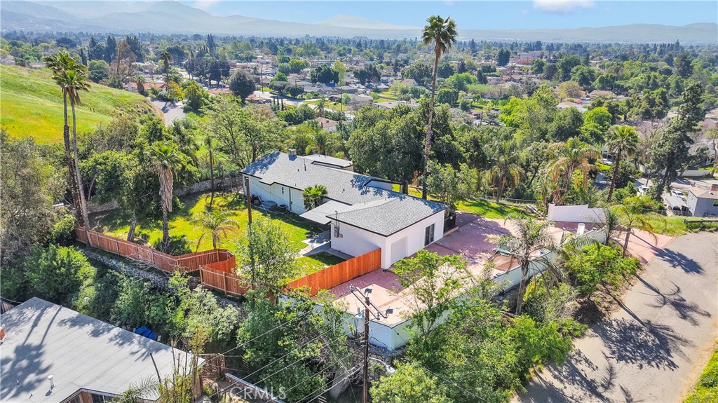 3489 Circle Road San Bernardino, CA 92405 - Photo 43 of 51 an aerial view of a house with a swimming pool outdoor seating and yard