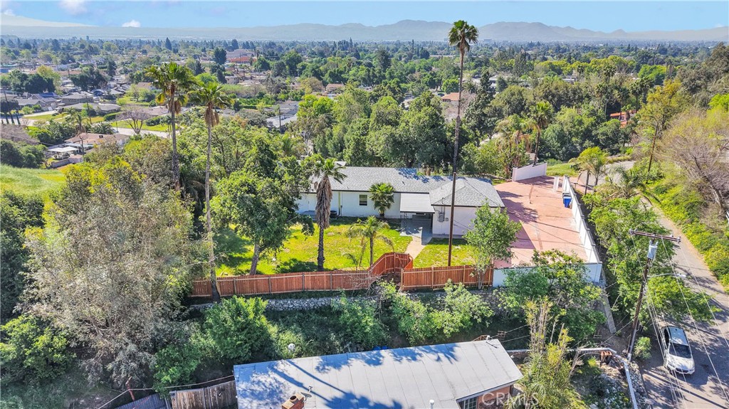 3489 Circle Road San Bernardino, CA 92405 - Photo 44 of 51 an aerial view of a house with a yard and lake view