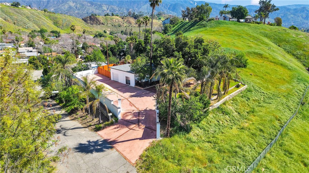 3489 Circle Road San Bernardino, CA 92405 - Photo 49 of 51 an aerial view of a house with a yard