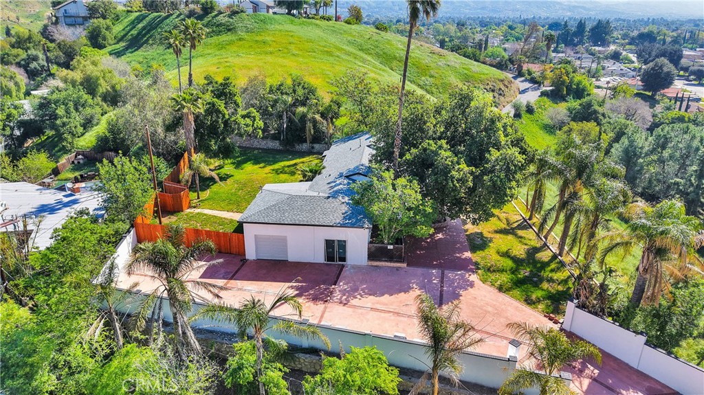 3489 Circle Road San Bernardino, CA 92405 - Photo 50 of 51 an aerial view of a house with swimming pool garden and patio