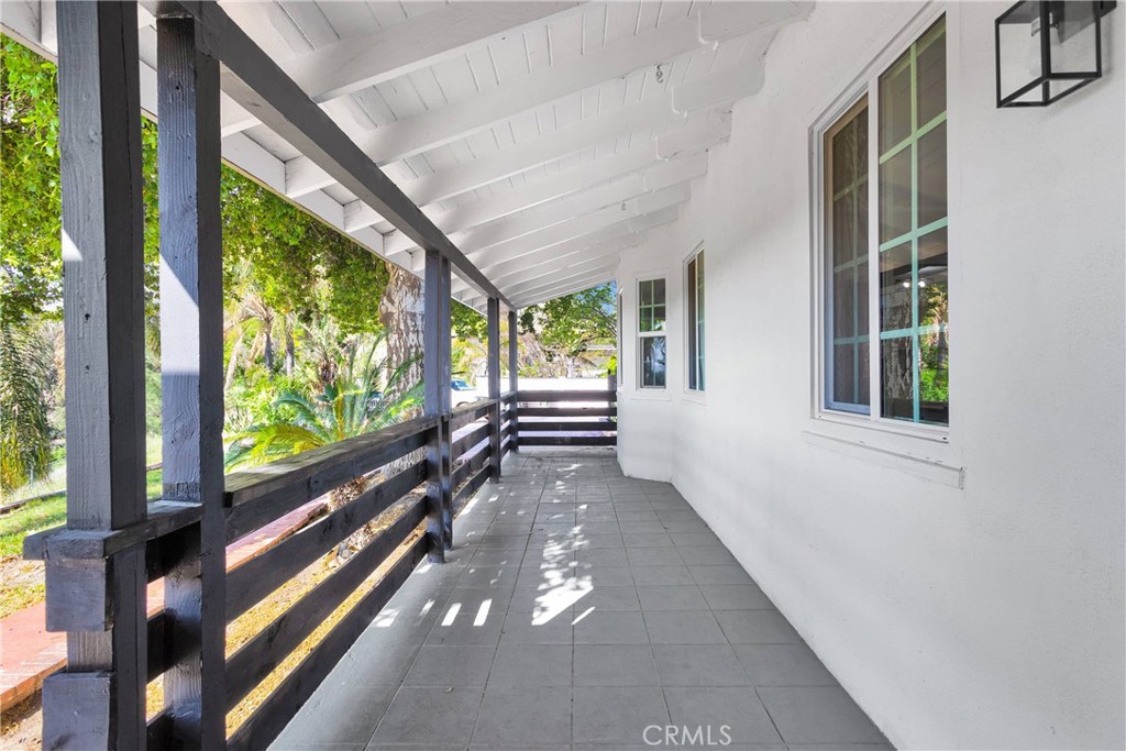 3489 Circle Road San Bernardino, CA 92405 - Photo 5 of 51 a view of a porch and garden