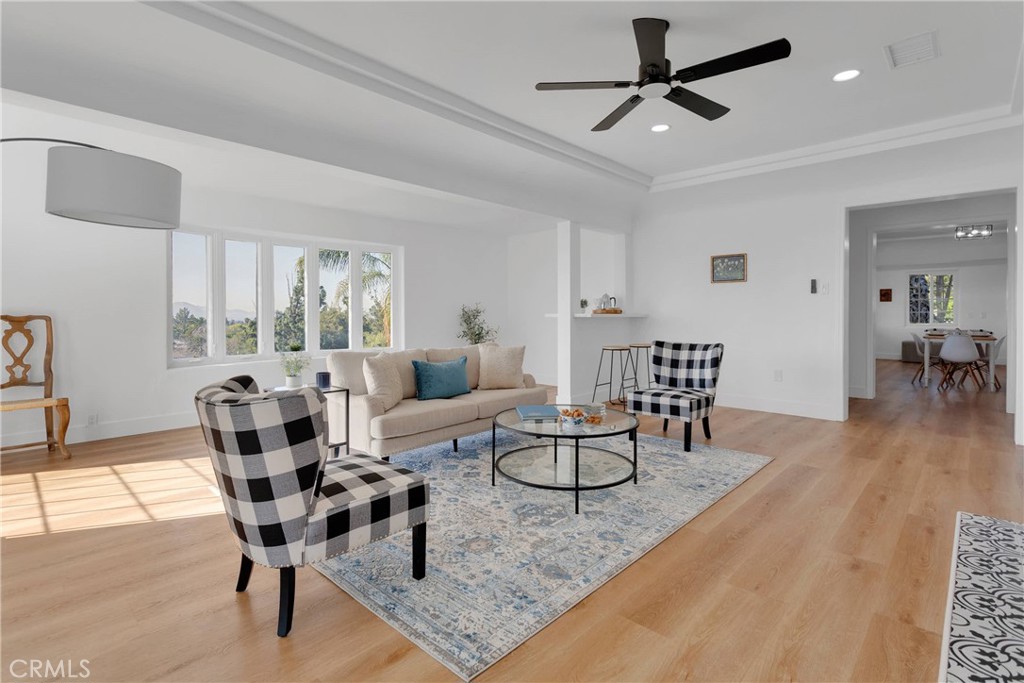 3489 Circle Road San Bernardino, CA 92405 - Photo 6 of 51 a living room with furniture and a wooden floor