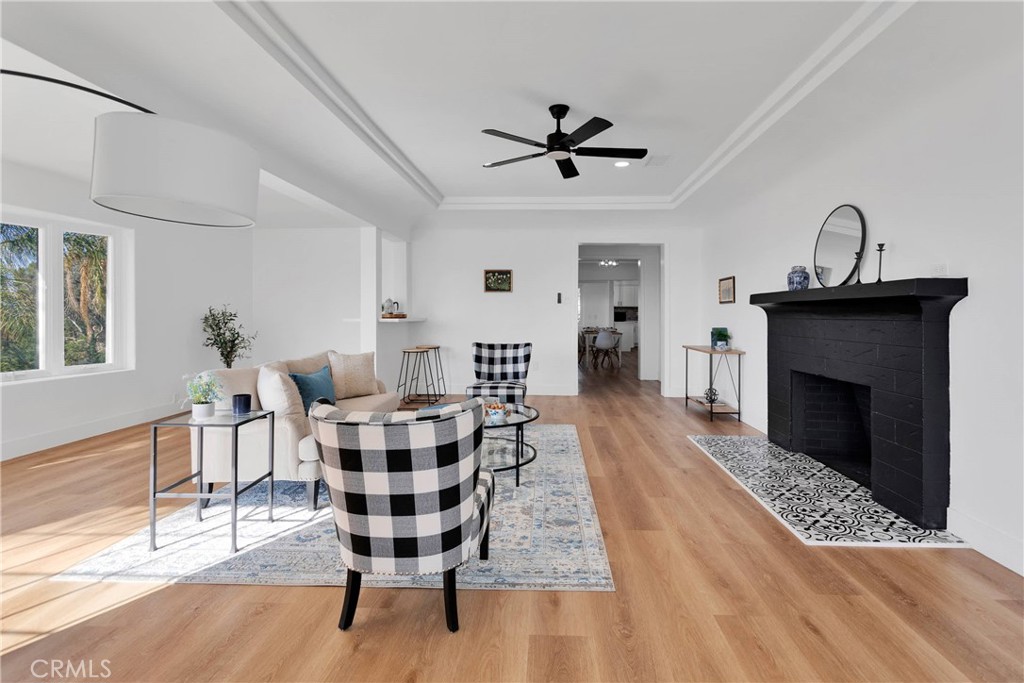 3489 Circle Road San Bernardino, CA 92405 - Photo 7 of 51 a living room with furniture and a fireplace