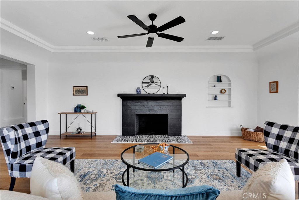 3489 Circle Road San Bernardino, CA 92405 - Photo 8 of 51 a living room with furniture and a wooden floor