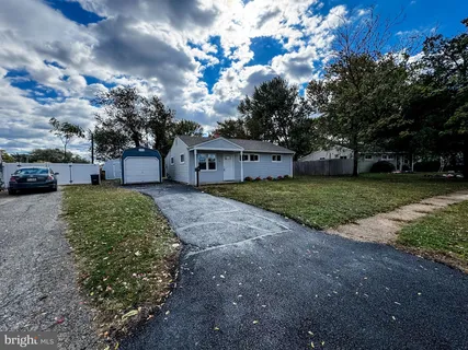 a house view with a backyard space