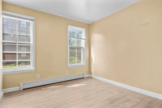an empty room with windows