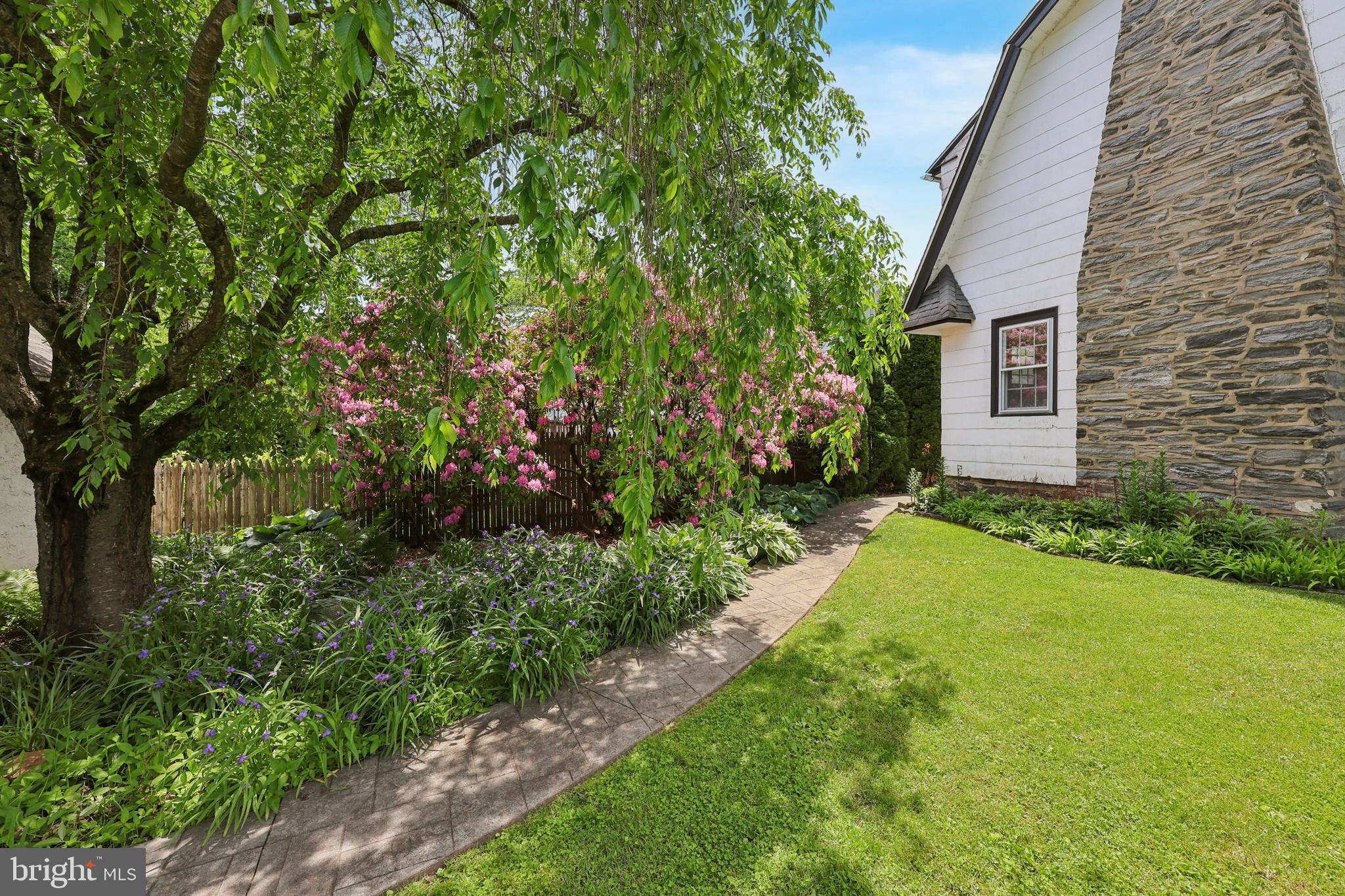 427 Righters Mill Road Gladwyne, PA 19035 - Photo 13 of 16 a view of a house with a yard and tree s