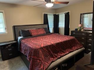 4177 Spirea Drive Columbus, GA 31907 - Photo 12 of 21 a bedroom with a bed and a dresser