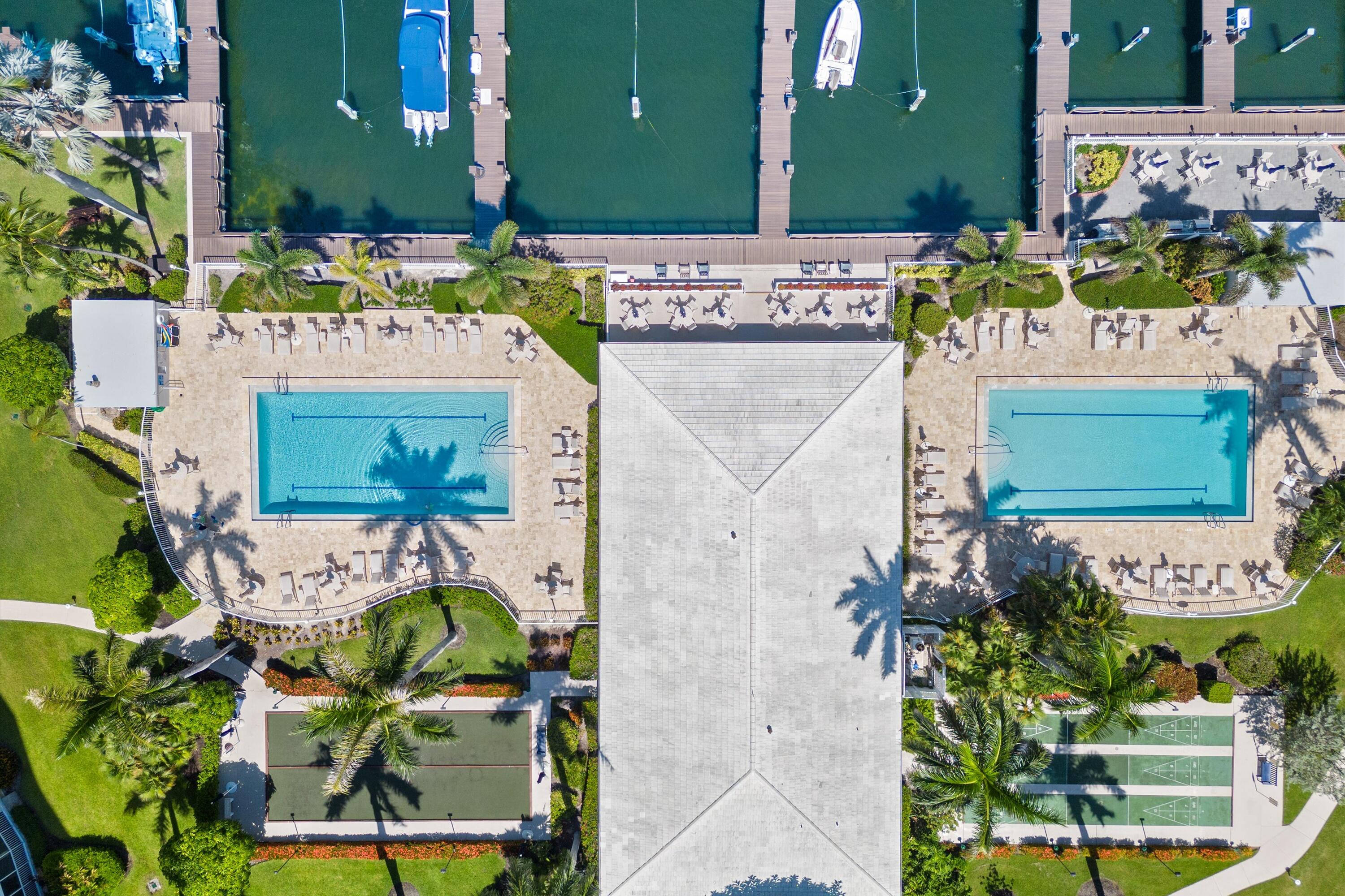 a bathroom with a sink mirror and vanity