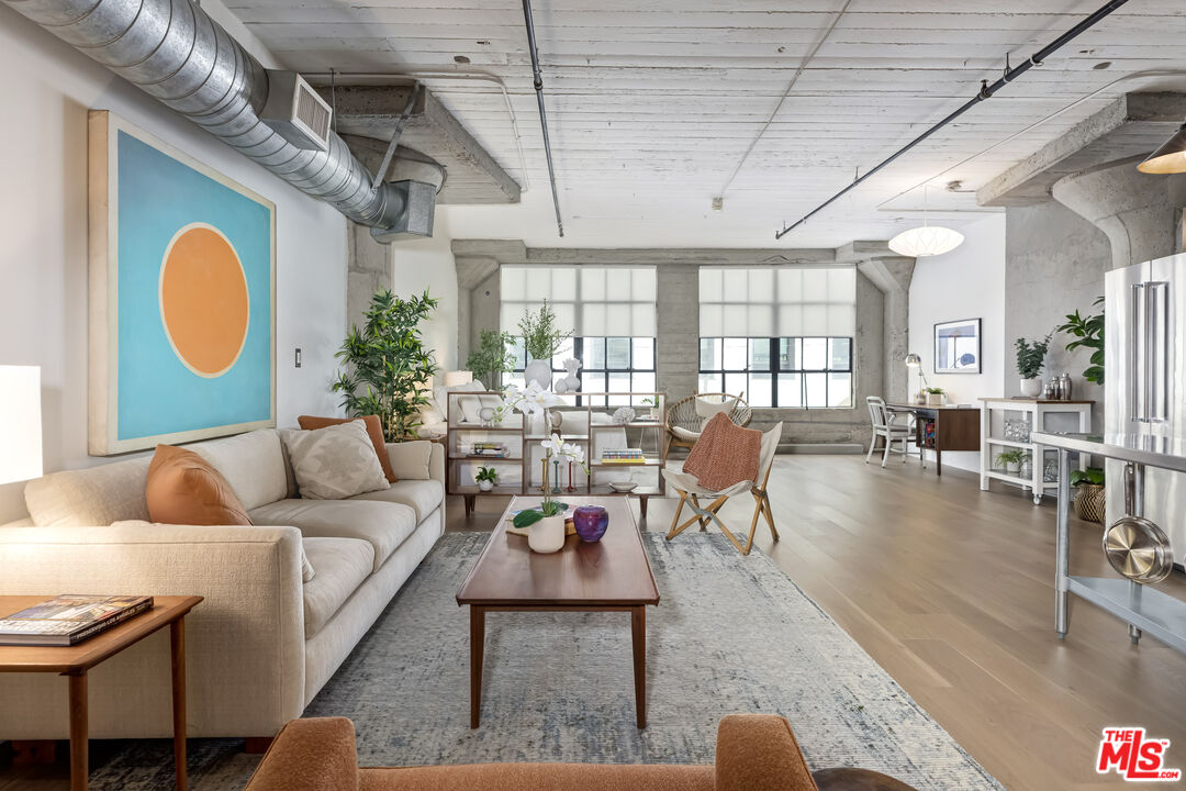 200 North San Fernando Road, Unit 208 Los Angeles, CA 90031 - Photo 1 of 37 a living room with furniture and a large window