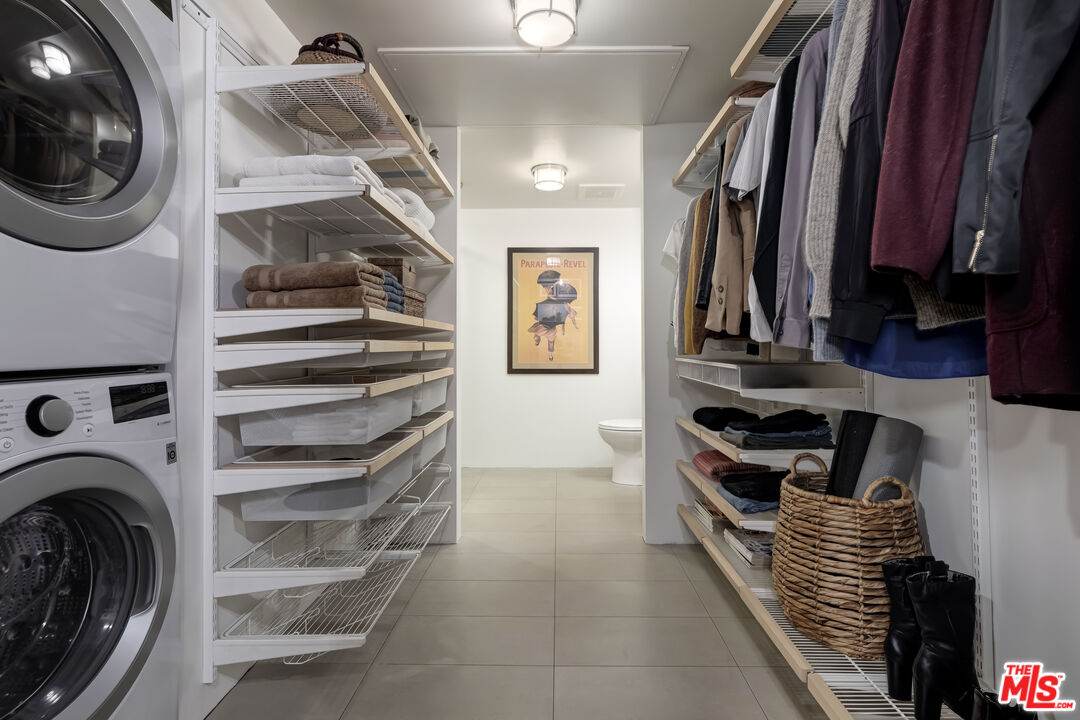 200 North San Fernando Road, Unit 208 Los Angeles, CA 90031 - Photo 20 of 37 a view of walk in closet with clothes and shoes