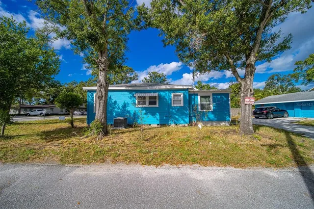 a front view of a house with swimming pool