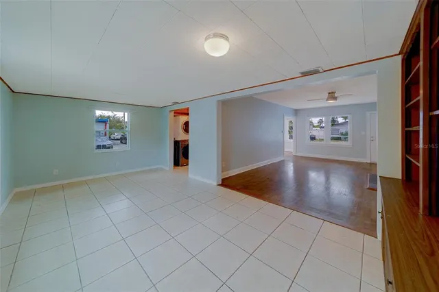 an empty room with windows