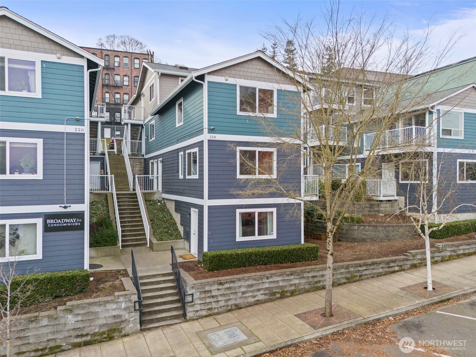 218 Broadway, Unit 5 Tacoma, WA 98402 - Photo 30 of 32 a front view of a house