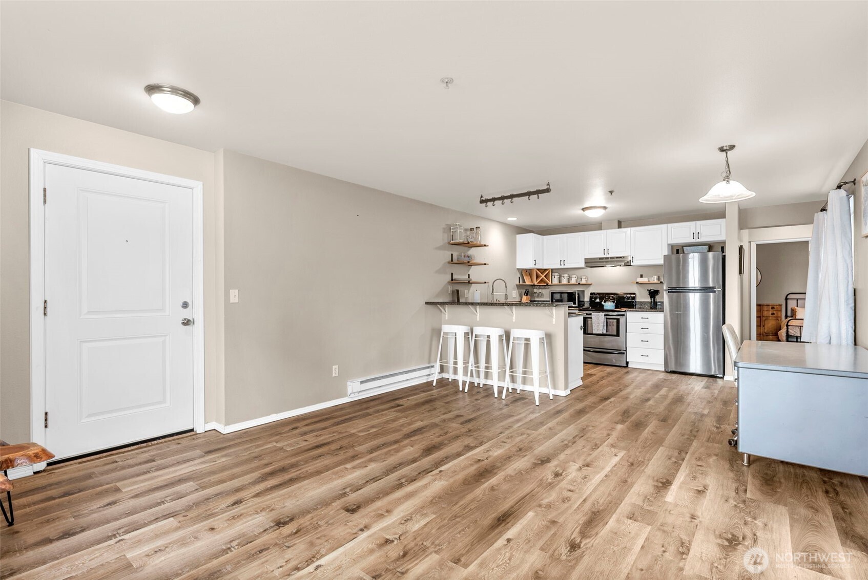 218 Broadway, Unit 5 Tacoma, WA 98402 - Photo 8 of 32 a view of kitchen with wooden floor