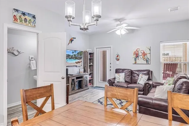 a kitchen with a sink a counter space and cabinets