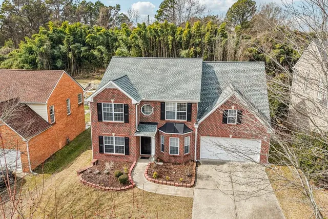 a view of a city with mountains