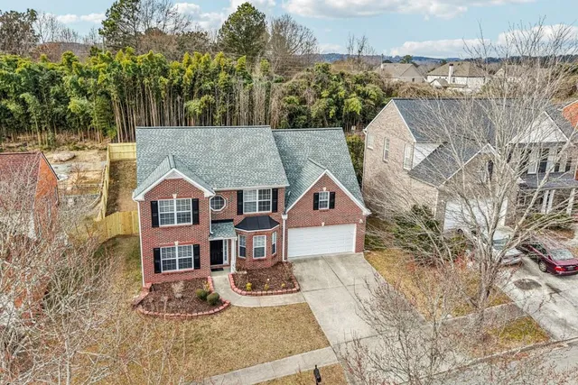 an aerial view of residential house with outdoor space