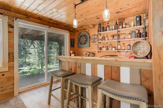 a view of a chairs and table in a patio