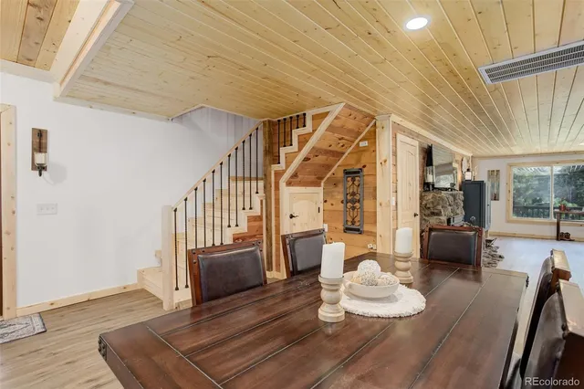 a living room with furniture and a table