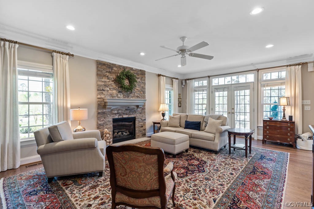 2436 Founders Bridge Road Midlothian, VA 23113 - Photo 11 of 45 a living room with furniture and a fireplace