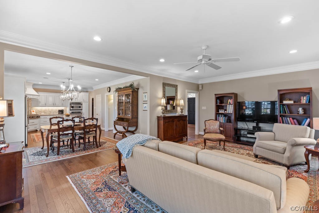 2436 Founders Bridge Road Midlothian, VA 23113 - Photo 12 of 45 a living room with furniture and wooden floor