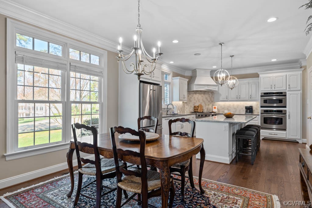 2436 Founders Bridge Road Midlothian, VA 23113 - Photo 13 of 45 a view of a dining room with furniture window and wooden floor
