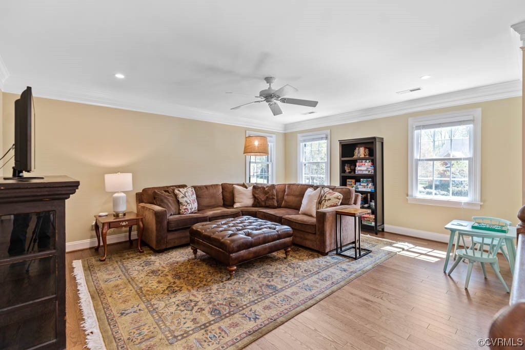 2436 Founders Bridge Road Midlothian, VA 23113 - Photo 24 of 45 a living room with furniture and a fireplace