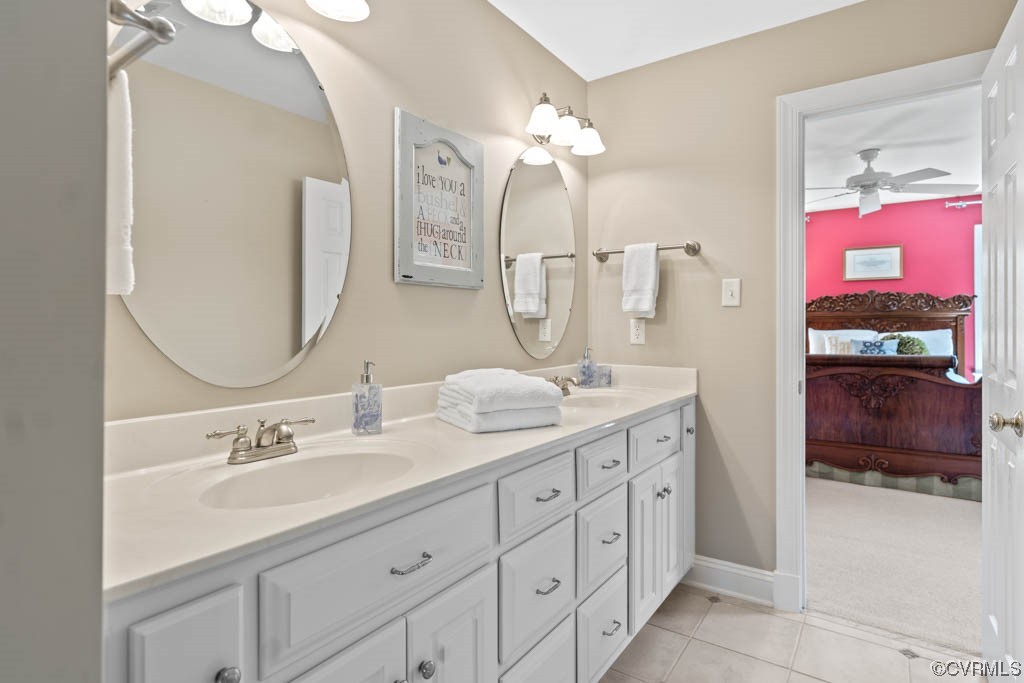 2436 Founders Bridge Road Midlothian, VA 23113 - Photo 28 of 45 a bathroom with a double vanity sink and a mirror