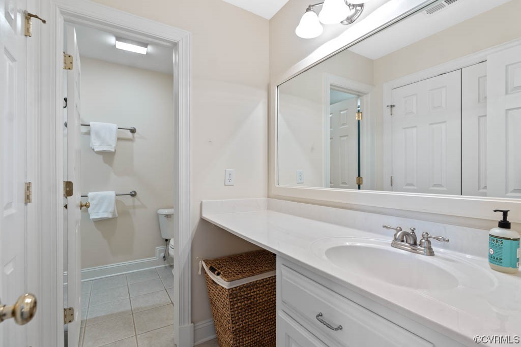 2436 Founders Bridge Road Midlothian, VA 23113 - Photo 30 of 45 a bathroom with a sink and a mirror