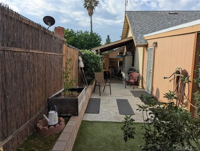 a view of swimming pool with patio