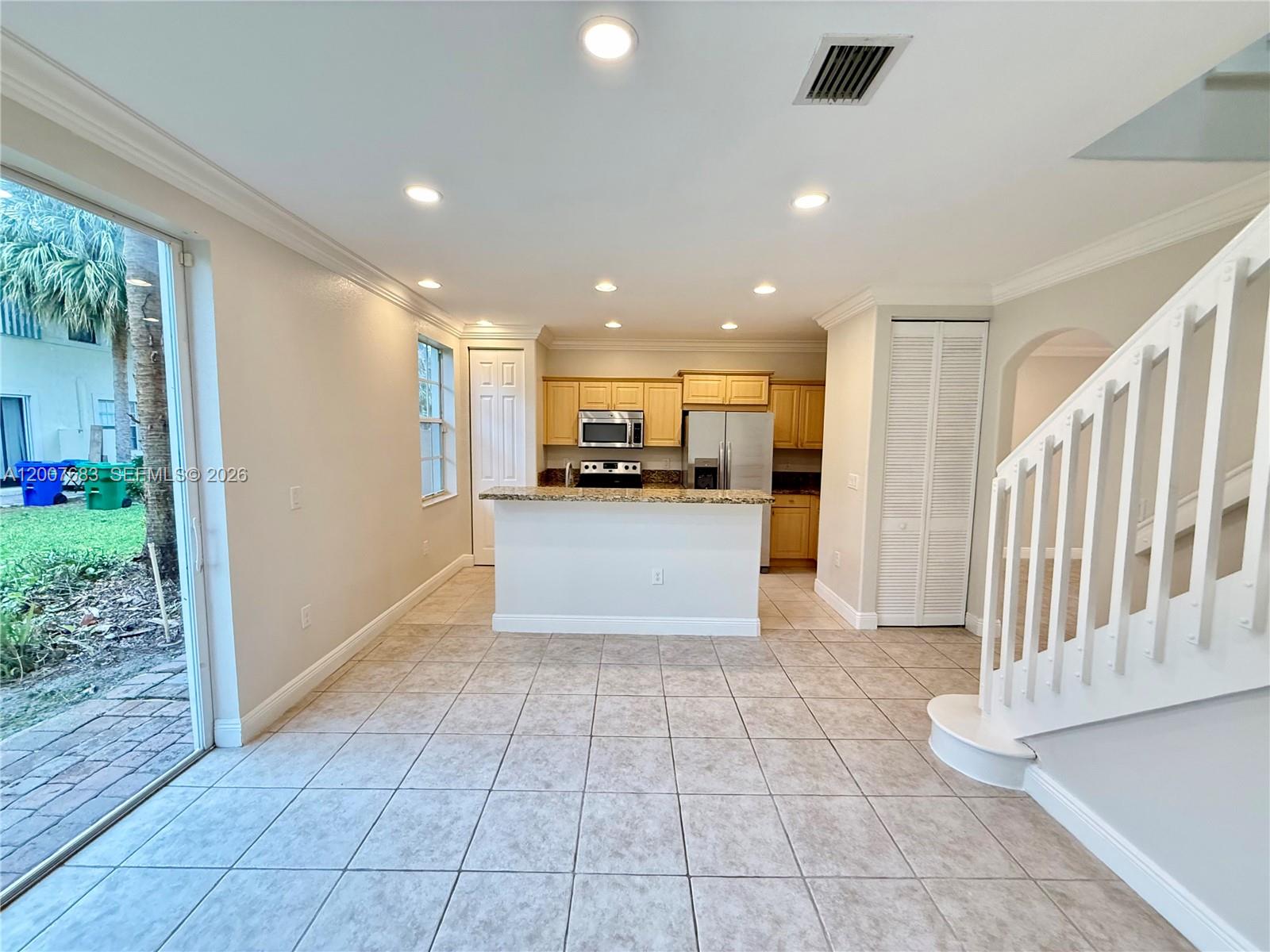 2674 Southwest 84th Terrace, Unit 102 Miramar, FL 33025 - Photo 17 of 57 a view of a kitchen with kitchen and entryway