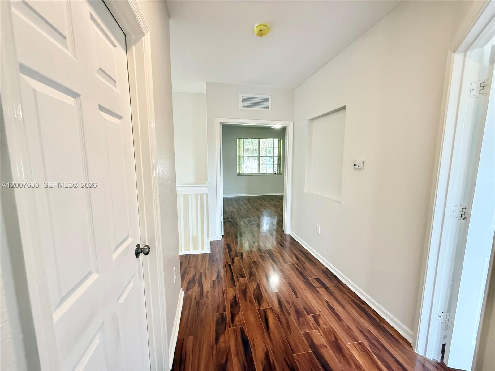 2674 Southwest 84th Terrace, Unit 102 Miramar, FL 33025 - Photo 29 of 57 a view of hallway with wooden floor