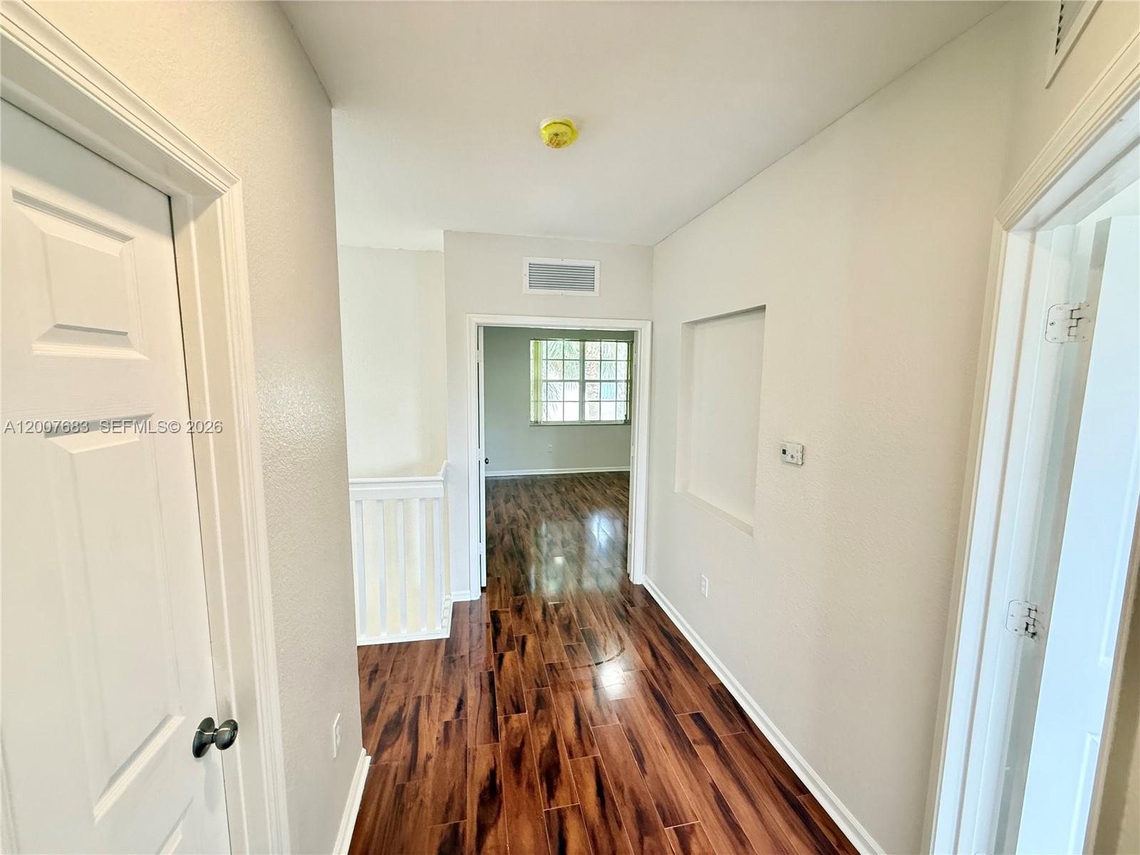 2674 Southwest 84th Terrace, Unit 102 Miramar, FL 33025 - Photo 32 of 57 a view of gallery with wooden floor